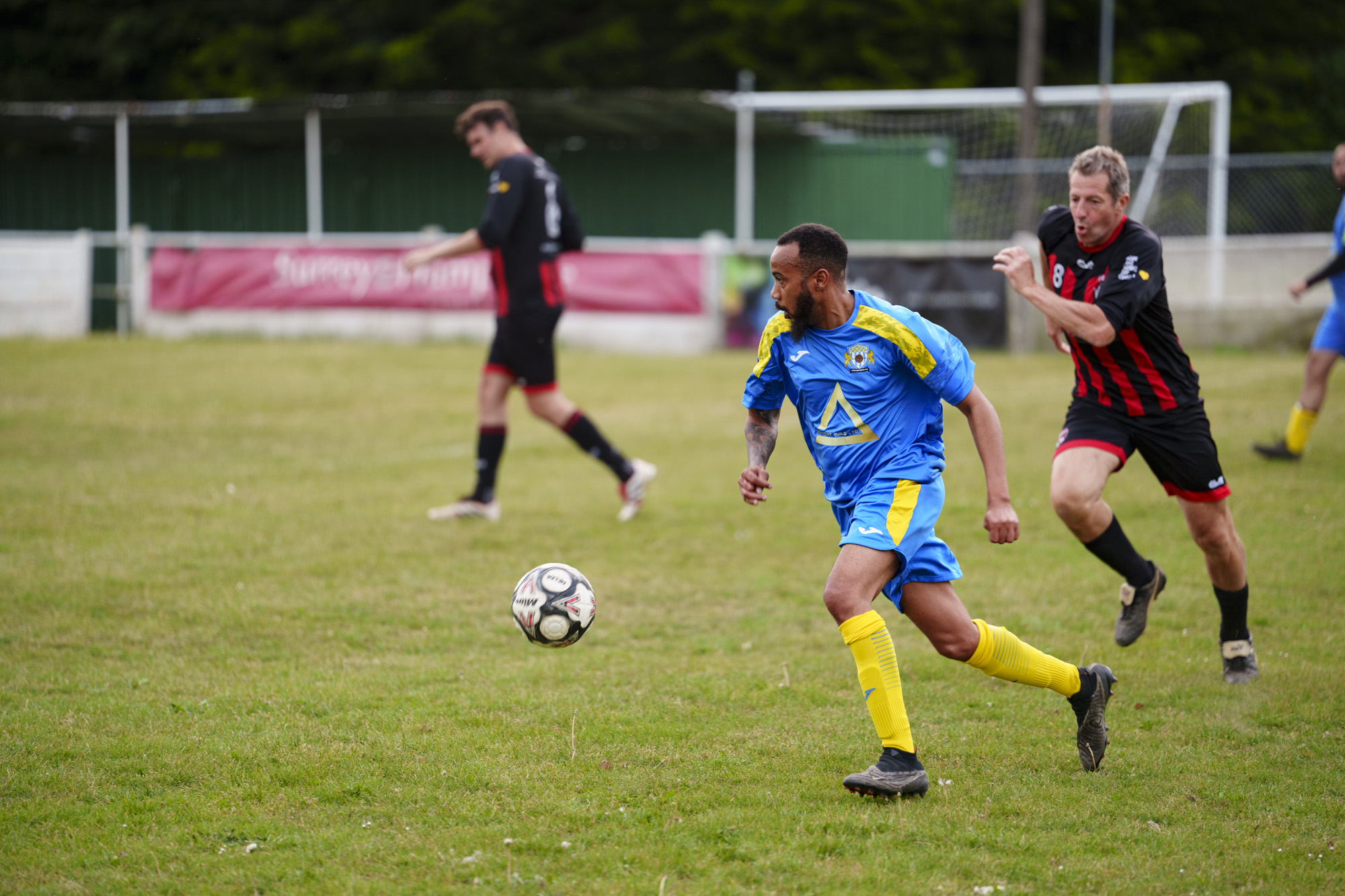 Soccer players in action, taken with the Sony FE 50-150mm F2 GM lens