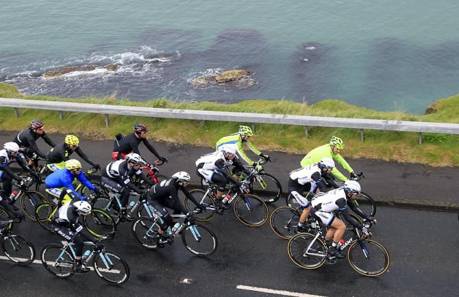 The peloton endured a cold, soaking rain in Northern Ireland
