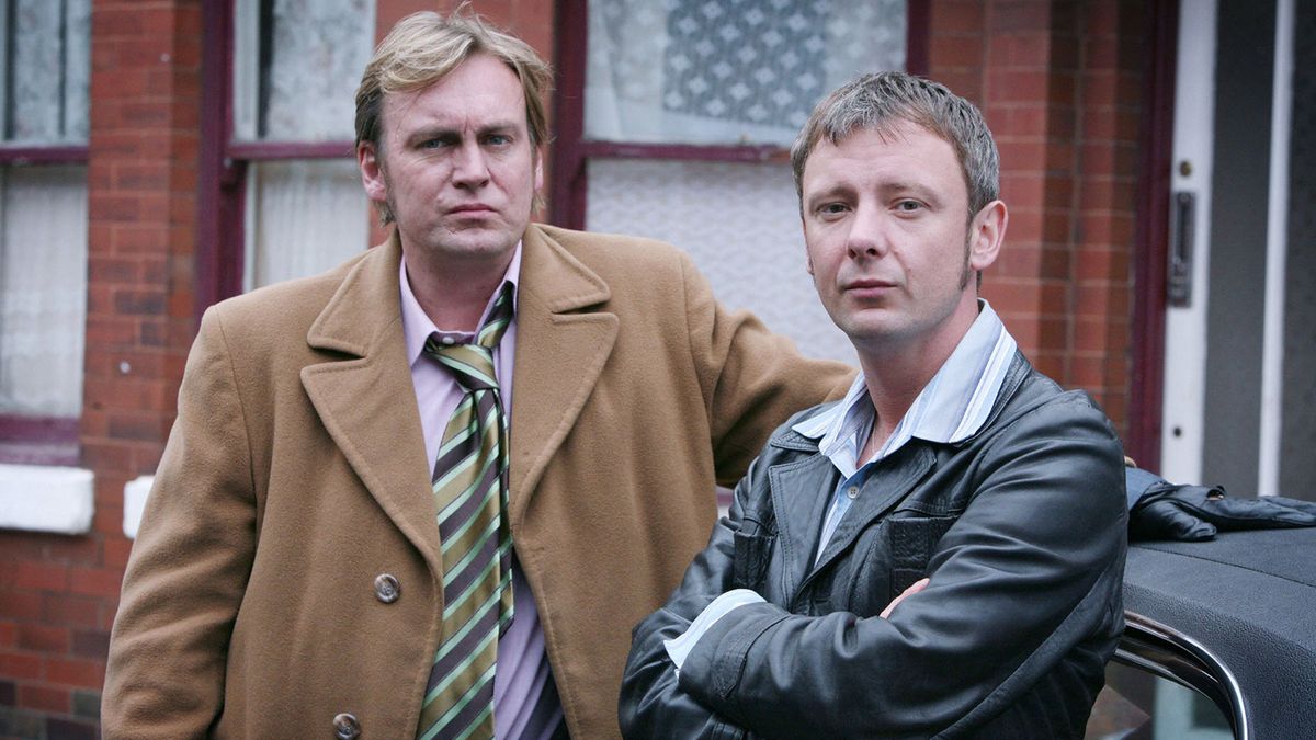 Philip Glenister and John Simm as Gene Hunt and Sam Tyler in Life on Mars