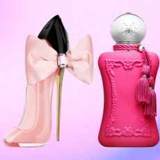Two perfume bottles in front of a pink and blue background