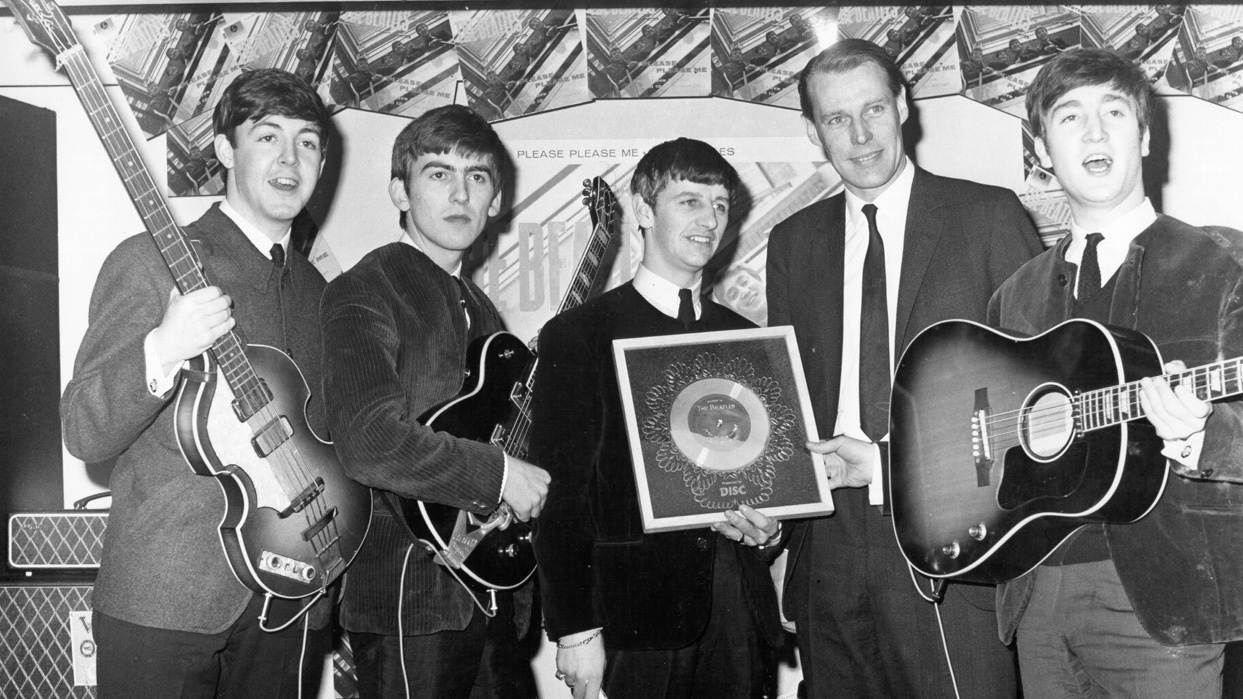 The Beatles with George Martin in 1964