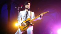 US singer Prince performs on October 11, 2009 at the Grand Palais in Paris. Prince has decided to give two extra concerts at the Grand Palais titled "All Day/All Night" after he discovered the exhibition hall during Karl Lagerfeld's Chanel fashion show