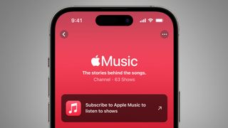 A phone on a grey background showing the Apple Music app
