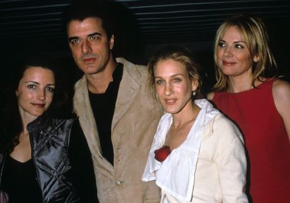 Kritsin Davis, Chris Noth, Sarah Jessica Parker and Kim Cattrall at a party.
