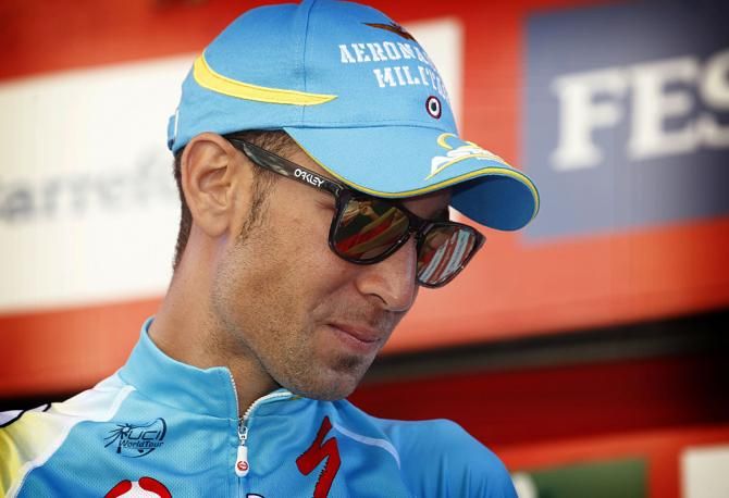 Vincenzo Nibali still wearing dark glasses to cover his swollen wasp-stung eyes
