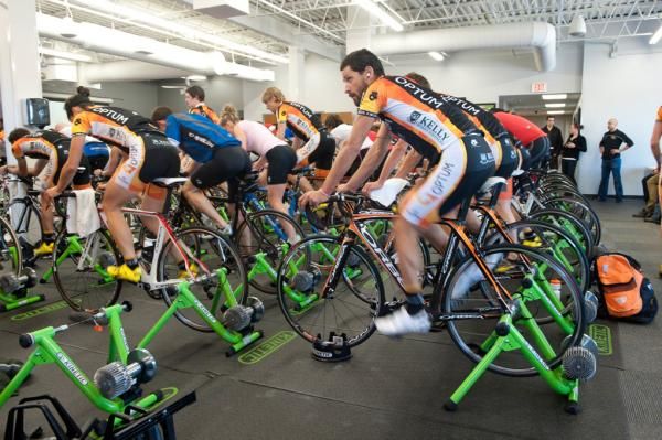 Alex Candelario spins along with a few dozen others on Kinetic trainers.