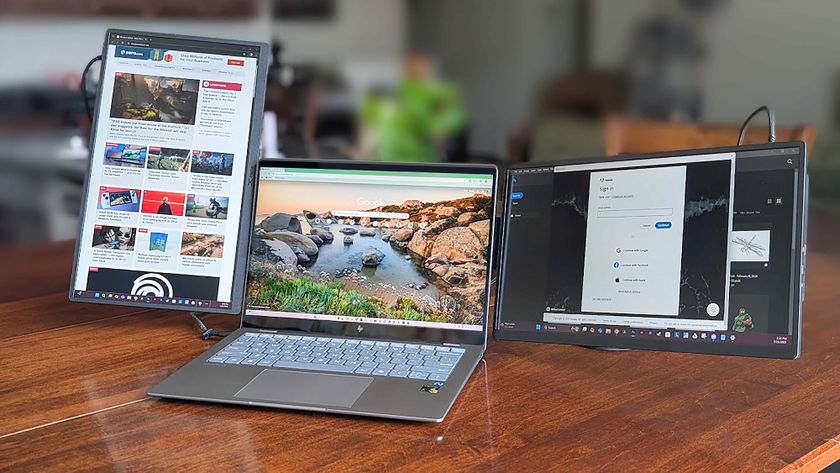 JSAUX FlipGo Horizon connected to a laptop with the left monitor in portrait mode and the right in landscpe orientation. 