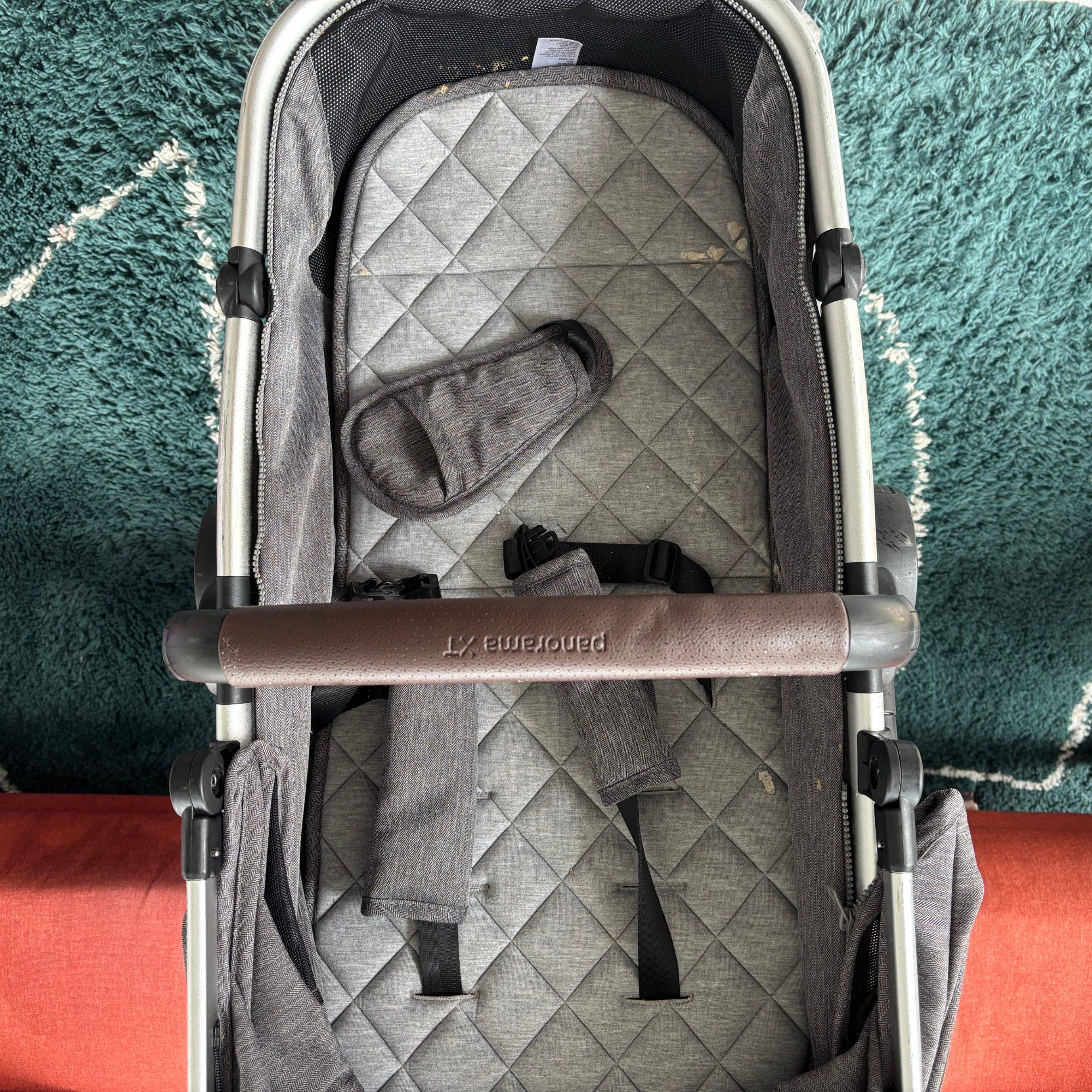 Using the Bissell SpotClean HydroSteam to clean a baby pushchair - before