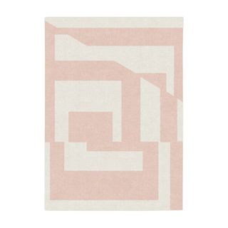 A pink rug with geometric pattern