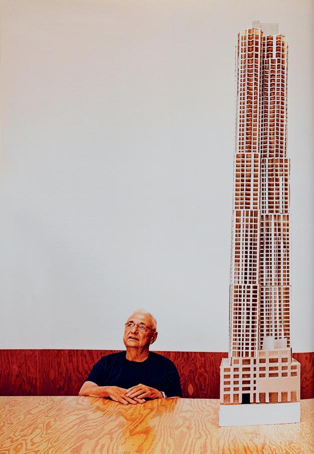 Gehry with a model of New York by Gehry from W*153
