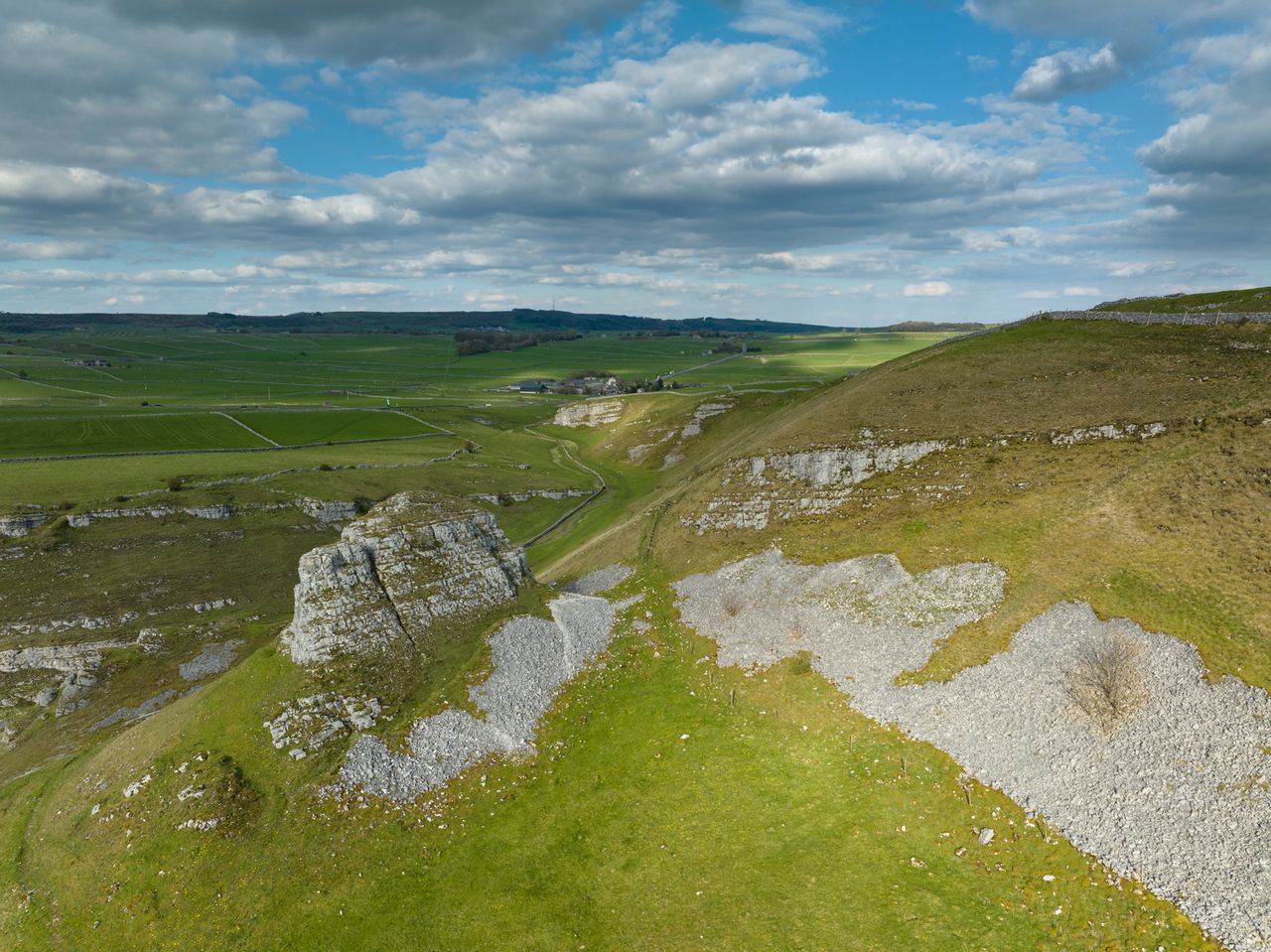 Photo taken by the DJI Mavic 3 Pro drone. Focal Length comparison at 24 mm. Here we see a wide angle shot of the side of a hill.