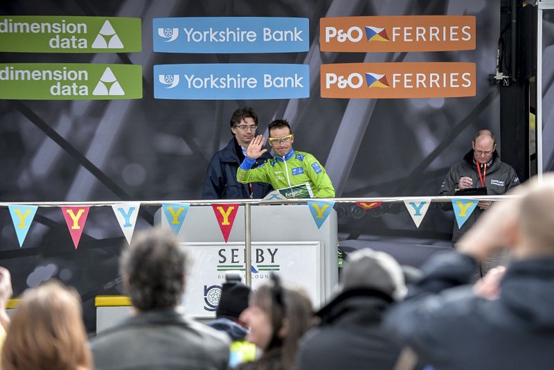 Thomas Voeckler (Europcar) waves from the stage