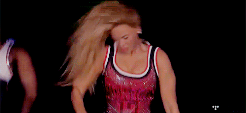 Beyonce dances vigorously
