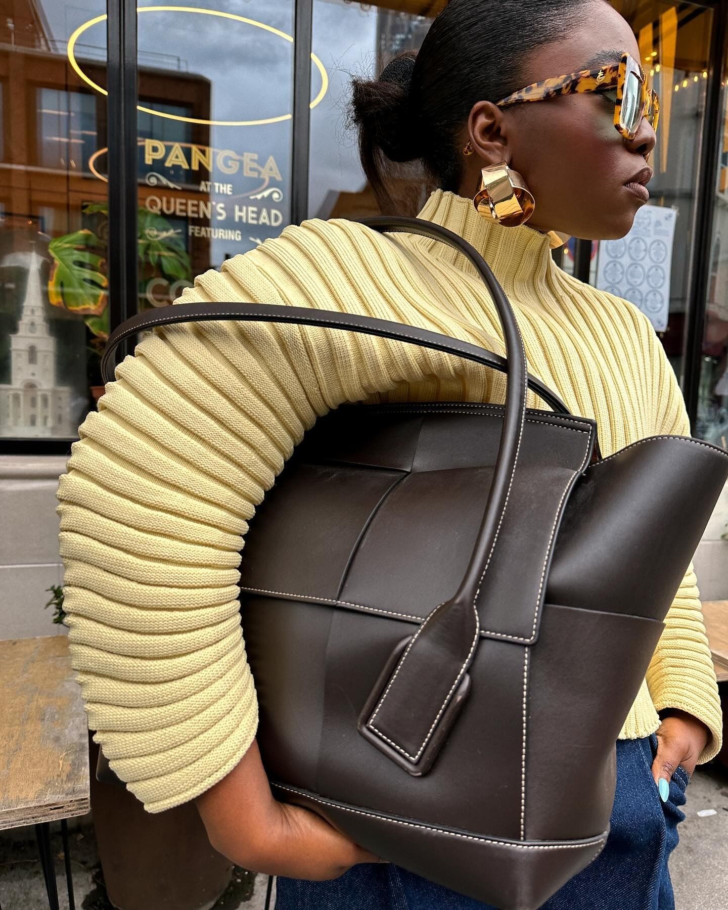 CEO of London-based contemporary fashion brand Kai Collective, Fisayo Longe wears best statement earrings.