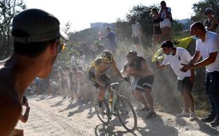 Team JumboVisma Belgian rider Wout van Aert ride during a break away through a dusty gravel road in the oneday classic cycling race Strade Bianche White Roads on August 1 2020 around Siena Tuscany Photo by Marco Bertorello AFP Photo by MARCO BERTORELLOAFP via Getty Images