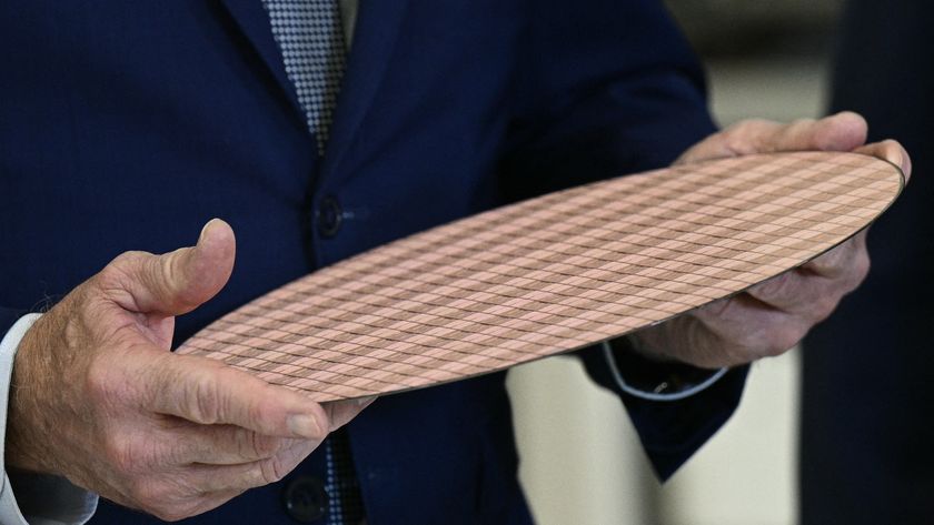Man holding a wafer