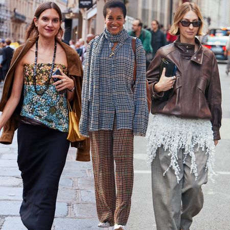 Three women on the streets during paris fashion week.