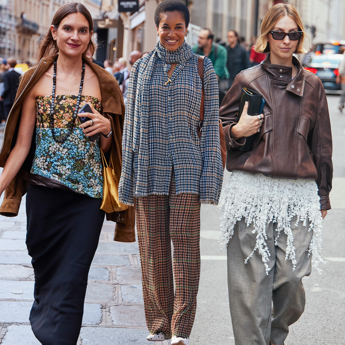 Three women on the streets during paris fashion week.