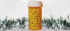 Toy soldiers and a pill bottle.