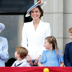 Queen Elizabeth II, Prince Louis of Cambridge, Catherine, Duchess of Cambridge, Princess Charlotte of Cambridge and Prince George of Cambridge watch a flypast from the balcony of Buckingham Palace during Trooping the Colour on June 2, 2022 in London, England. Trooping The Colour, also known as The Queen's Birthday Parade, is a military ceremony performed by regiments of the British Army that has taken place since the mid-17th century. It marks the official birthday of the British Sovereign. This year, from June 2 to June 5, 2022, there is the added celebration of the Platinum Jubilee of Elizabeth II in the UK and Commonwealth to mark the 70th anniversary of her accession to the throne on 6 February 1952