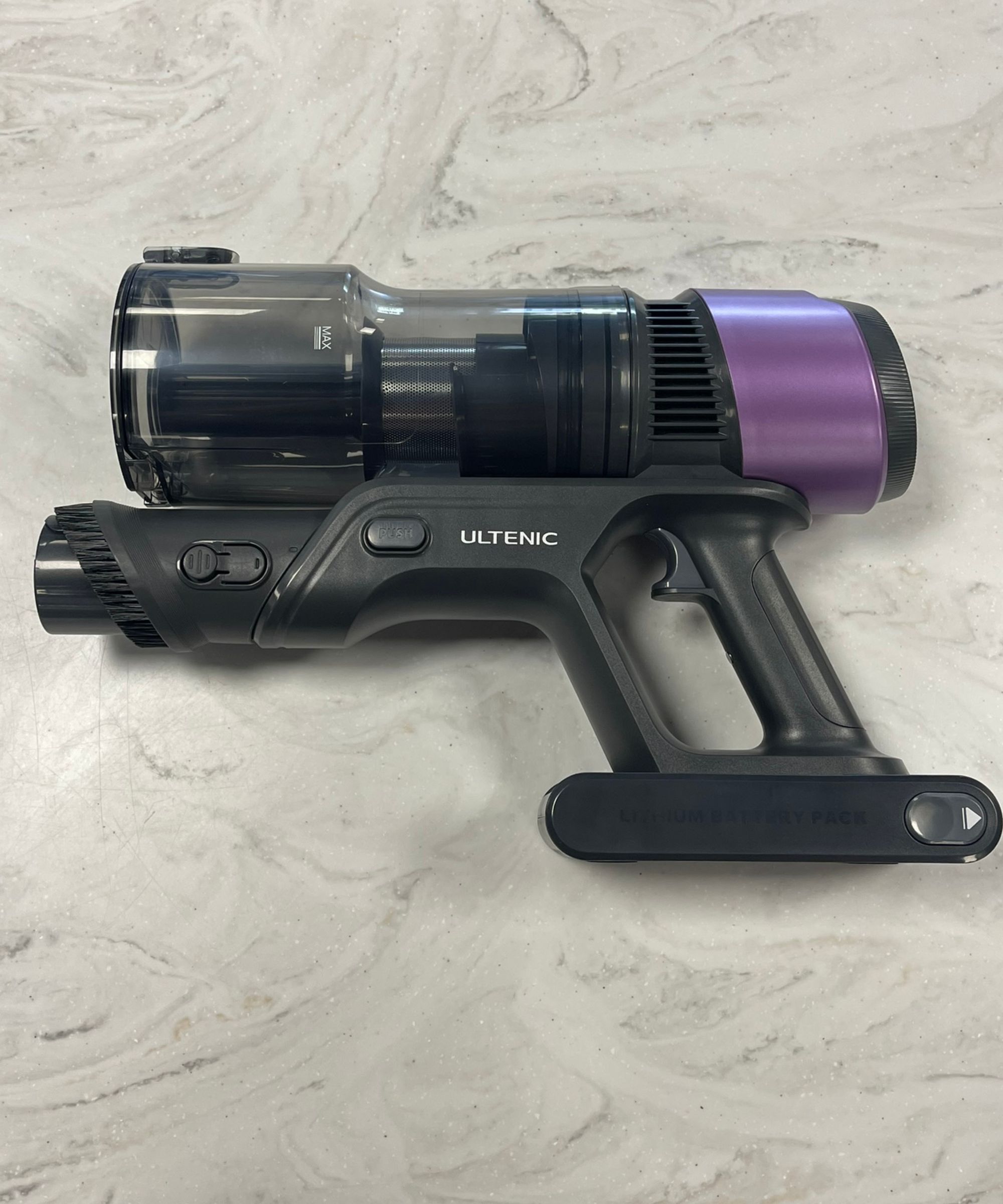 Ultenic U20 cordless vacuum without attachments on marble countertop in Future test center.