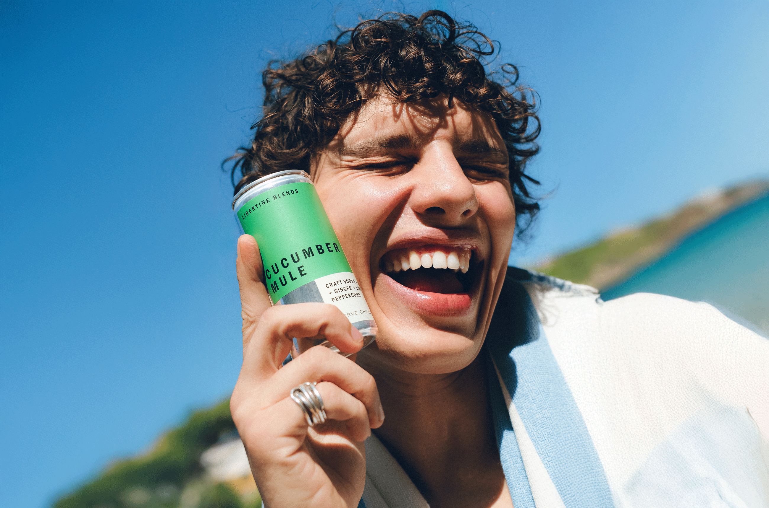 Person with canned cocktail