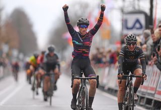 Tiffany Cromwell celebrates teammate Alexis Ryan's podium finish at Ronde van Drenthe