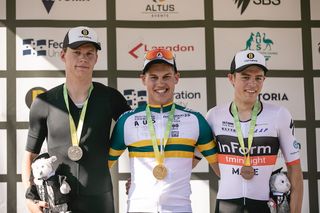 Second-placed Kelland O'Brien (St Kilda Cycling Club), winner Lucas Plapp and his InForm TM Insight Make teammate Carter Turnbull in third place share the under-23 men's time trial podium at the 2020 Australian Road Championships