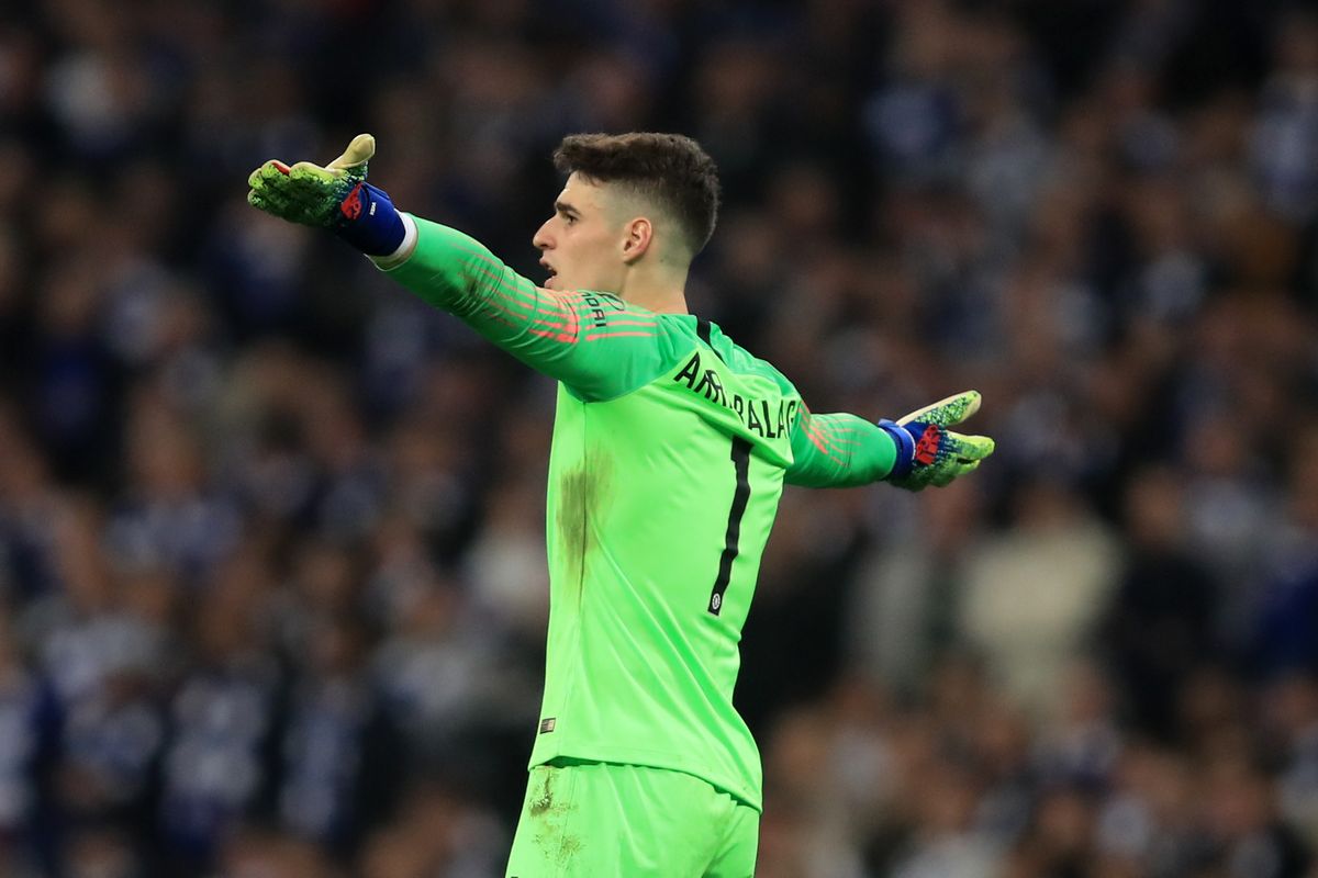 Chelsea goalkeeper Kepa Arrizabalaga argues with manager Maurizio Sarri, refusing to be substituted ahead of the penalty shootout in the 2019 League Cup final against Manchester City at Wembley