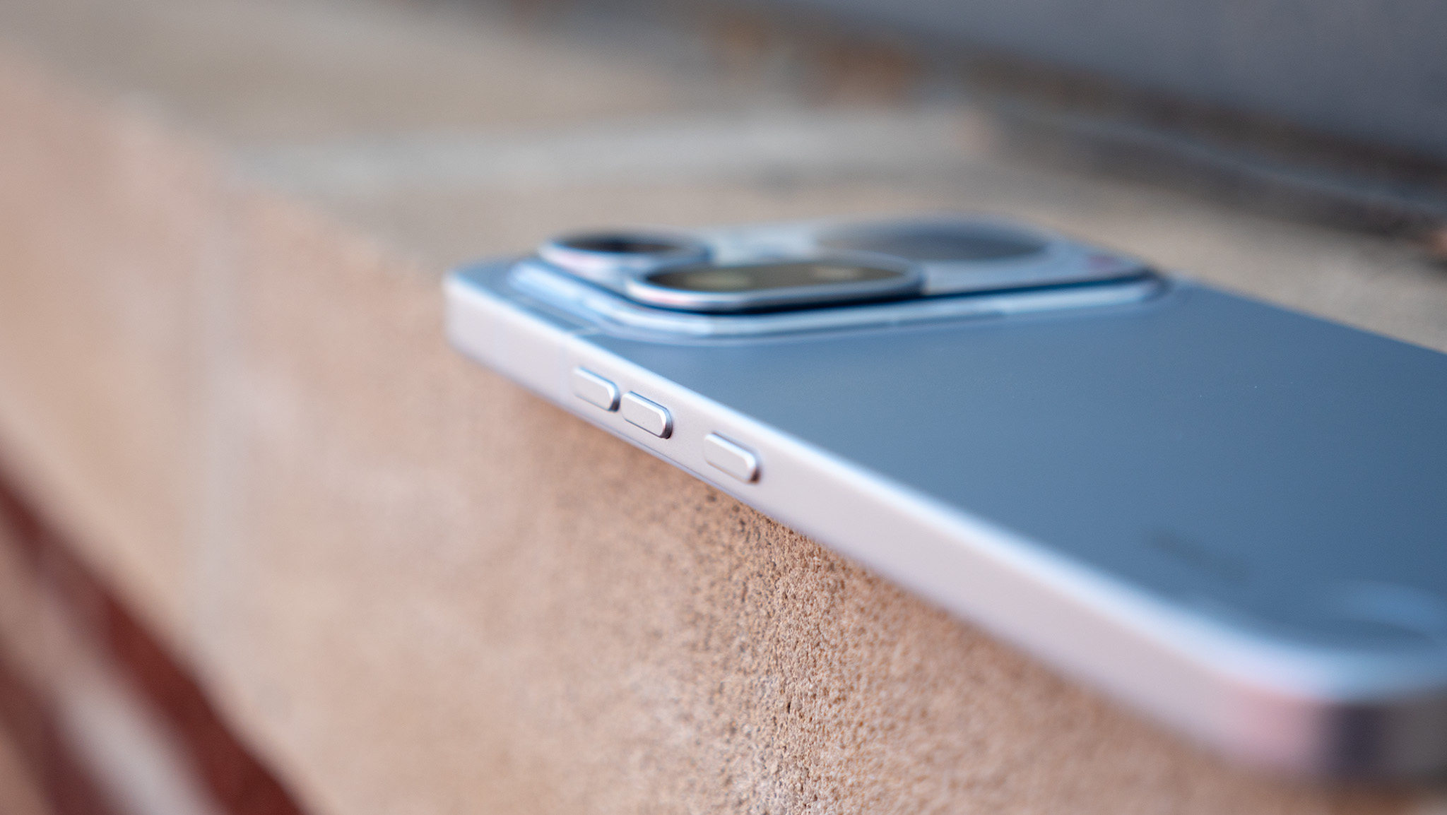 A close-up look at the buttons, ports, and camera lenses on the Nothing Phone 4a Pro