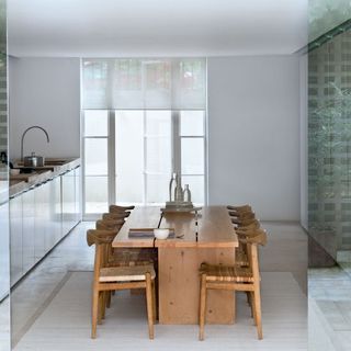 kitchen room with wooden dining table and chairs