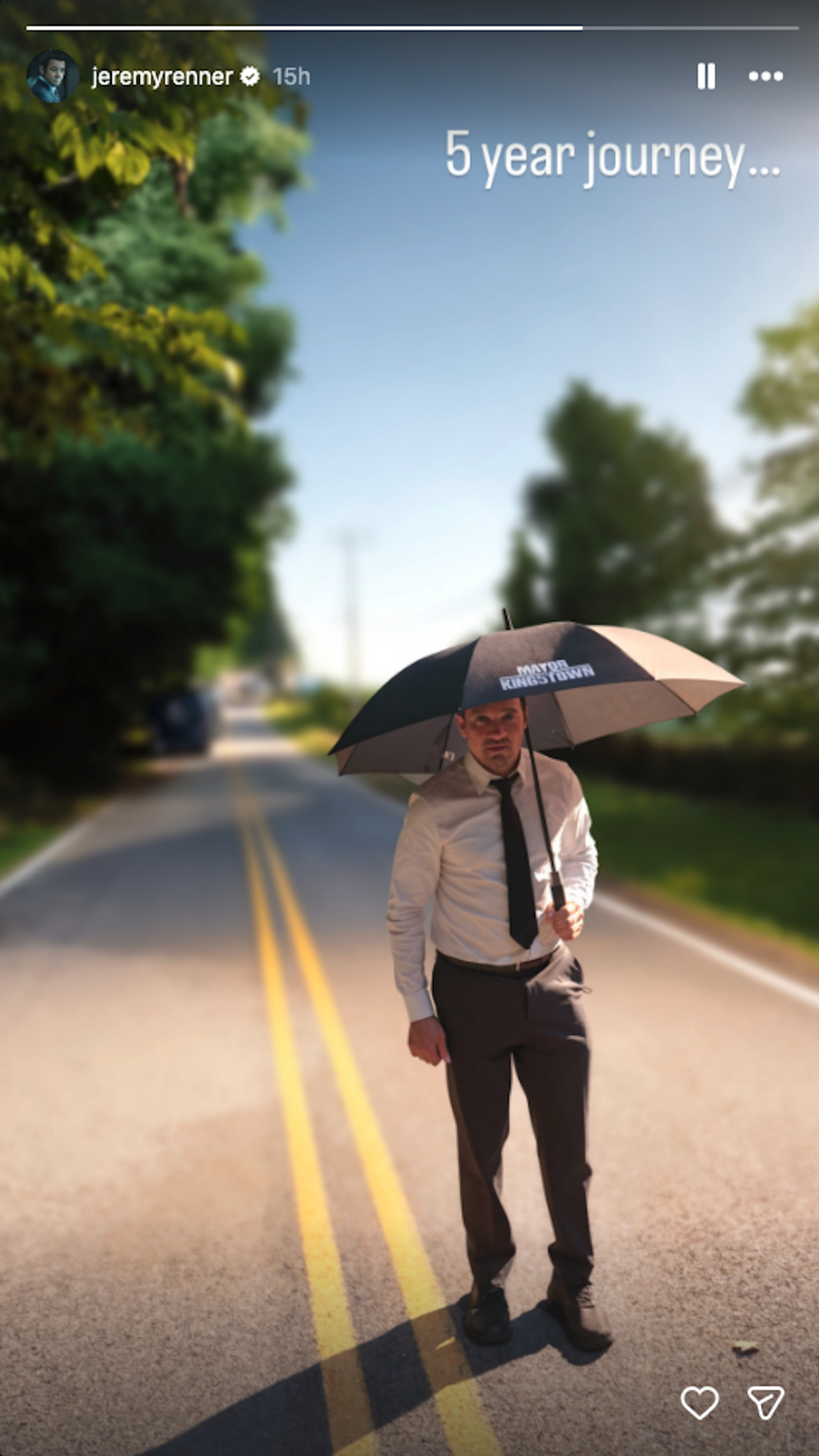 Jeremy Renner on the set of Mayor of Kingstown June 2026 with branded umbrella