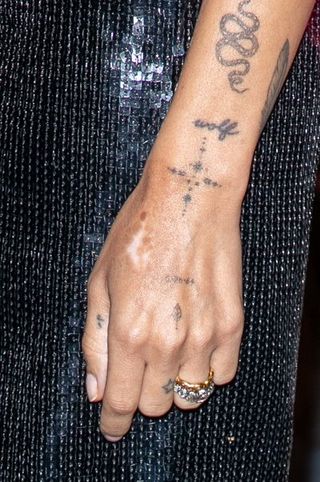 Wrist, Finger, Hand, Arm, Tattoo, Temporary tattoo, Nail, Design, Pattern, Flesh,
