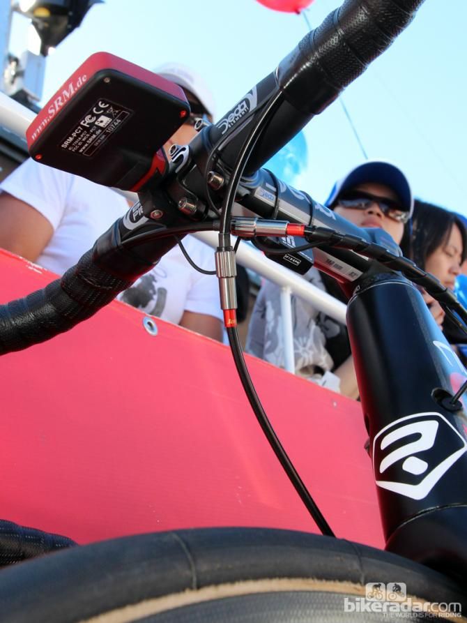 As there are no barrel adjusters on the integrated linear-pull brakes of Lotto-Belisol's Ridley Noah FAST, mechanics install inline adjusters instead.