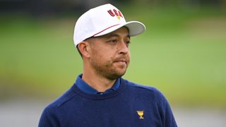 Xander Schauffele looks on during a practice round for the Presidents Cup