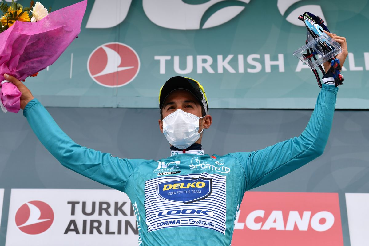 TURGUTREIS TURKEY APRIL 17 Jos Manuel Daz Gallego of Spain and Team DELKO Turquoise Leader Jersey celebrates at Podium during the 56th Presidential Cycling Tour Of Turkey 2021 Stage 7 a 180km stage from Marmaris to Turgutreis TUR2021 tourofturkeyTUR on April 17 2021 in Turgutreis Turkey Photo by Stuart FranklinGetty Images