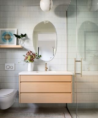 bathroom with wooden vanity