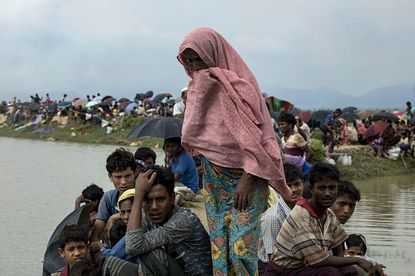 Rohingya refugees gather on the border of Myanmar and Bangladesh.