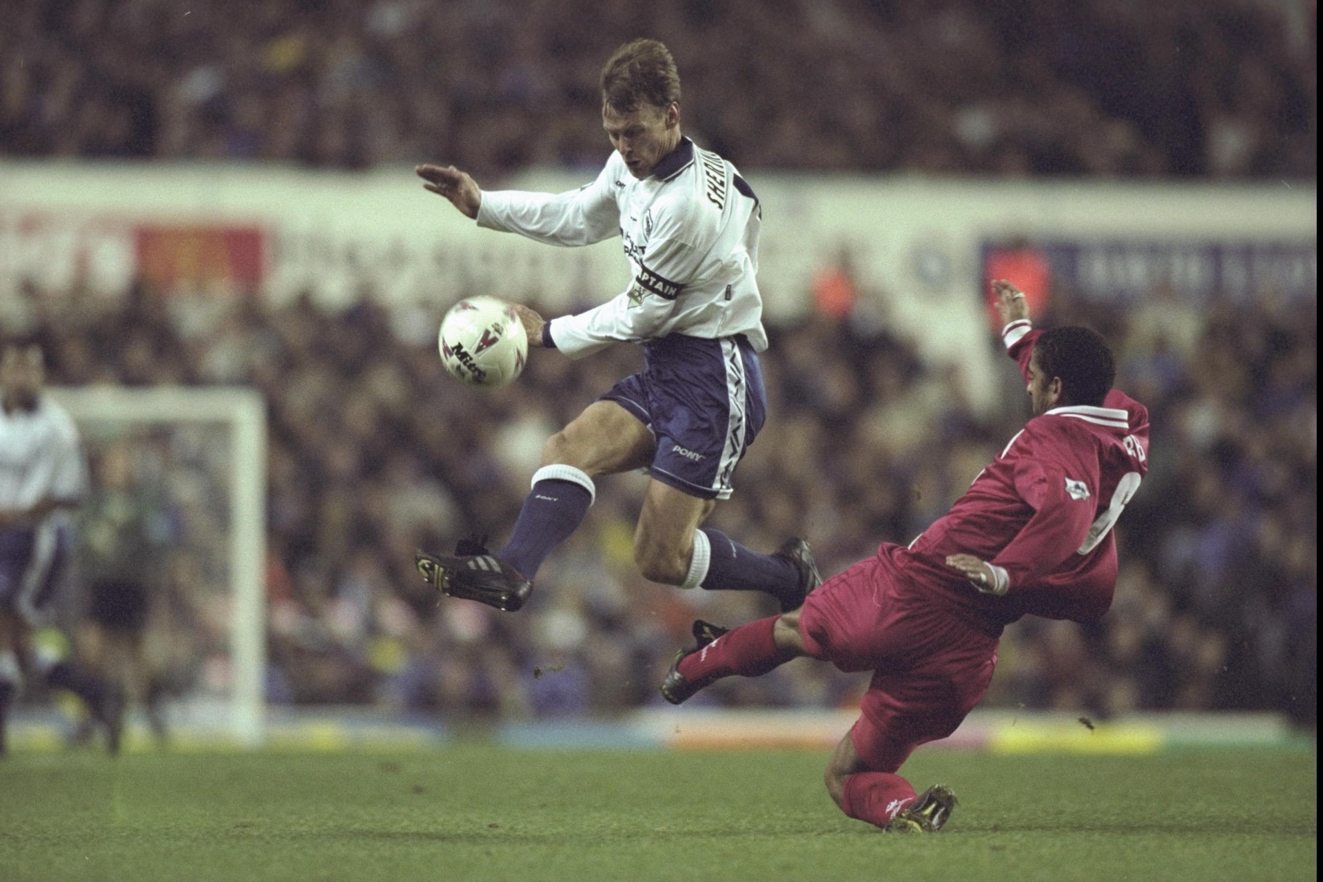 3 Dec 1996: Teddy Sheringham of Spurs (left) out-jumps Phil Babb of Liverpool for the ball, during the FA Carling premier league match between Tottenham Hotspurs and Liverpool at White Hart Lane in London. Liverpool won 0-2.