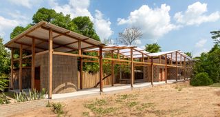 hero exterior of outdoor structures and pavilions at centre for babassu harvesters in brazil
