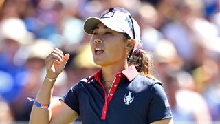 Danielle Kang celebrates a putt during the third round of the 2023 Solheim Cup