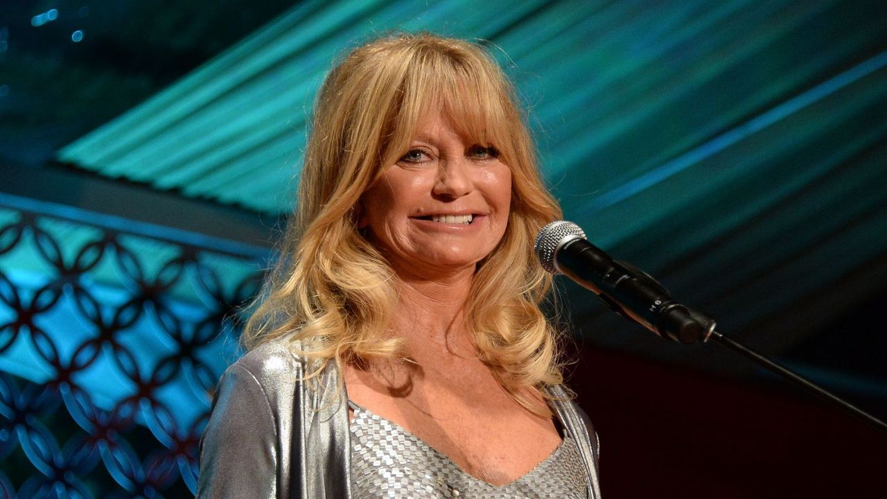 goldie hawn on blue background