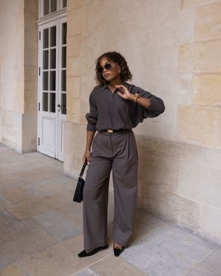 A fashion woman in a grey sweater