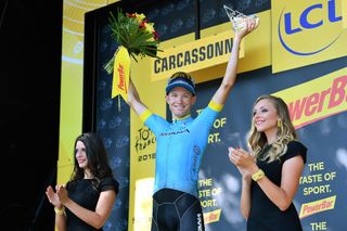 Magnus Cort on the Tour de France podium after winning stage 15