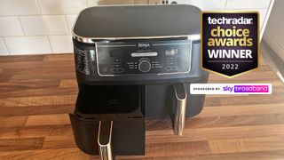 Ninja Foodi dual zone air fryer on kitchen surface with TechRadar Choice Awards winner logo