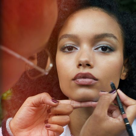 Whitney Peak having her make-up done for the new Chanel campaign