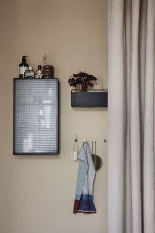 Black bathroom storage by Nest