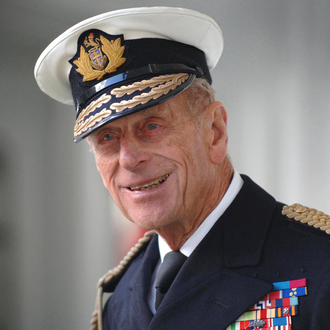 Prince Philip smirks while wearing his military uniform