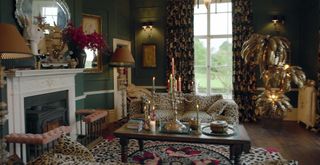 Maximalist living room with animal print sofa in Alice Temperley's house