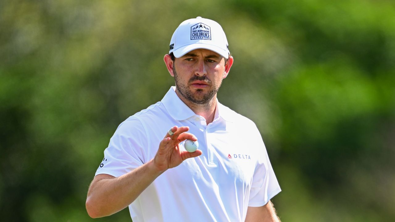 Patrick Cantlay shows his appreciation to the crowd while wearing a First Responders Children&#039;s Foundation cap at The Sentry in 2024